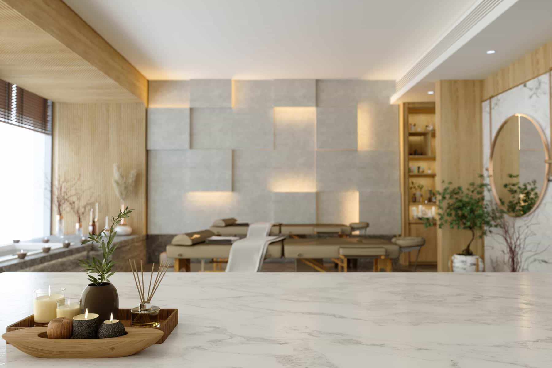 Warm boutique spa interior with candles, greenery, and massage tables at Bossa.